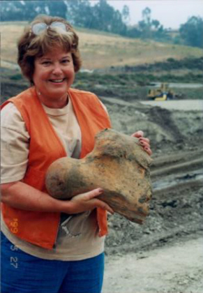 Paleontologist Carol Stadum Holding Mastodont Femu